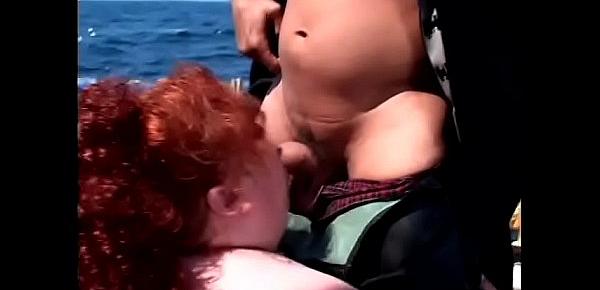  Fat lifeguard redhead babe Zazie gets pounded by a fit stud on board a ship